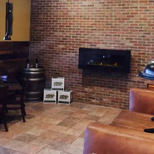 a brick wall and fireplace