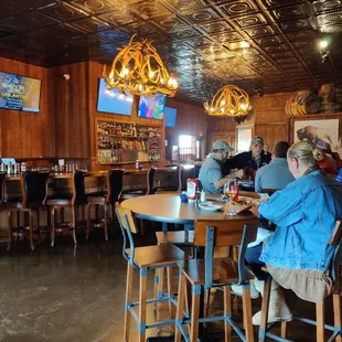 a group of people sitting at a table