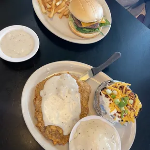 Cheese burger with fries.  Chicken Fried Steak with cream gravy mashed potatoes &amp; fully loaded baked potatoes.