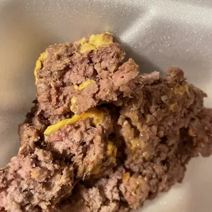 ground beef in a styrofoam container