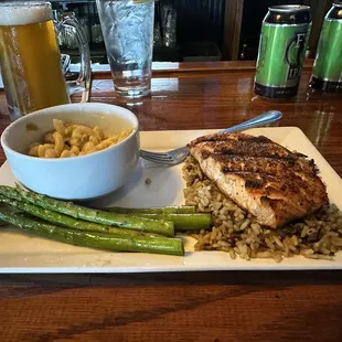 Salmon with man n cheese and asparagus over wild rice.