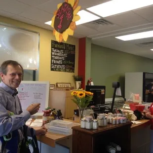 a man standing in front of a counter