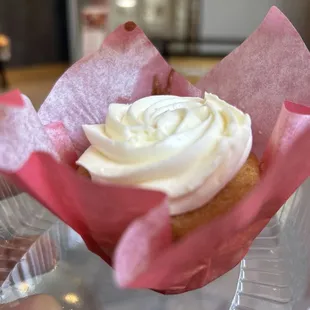 a cupcake in a paper wrapper