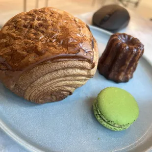 Chocolate croissant, pistachio macaron, canelé