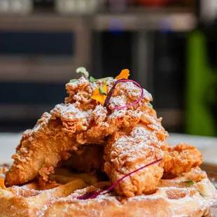 a plate of fried chicken and waffles