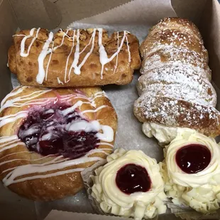 Cherry Danish, bear claw, large lady lock and white chocolate raspberry dessert