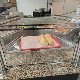 a hot dog in a display case