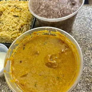 a bowl of soup and a bowl of rice