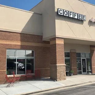 View from the parking lot with some outdoor seating