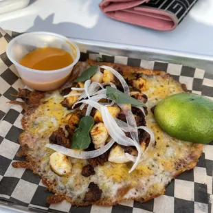 Those little white bits are octopus cooked to a delicate smooth moist perfection