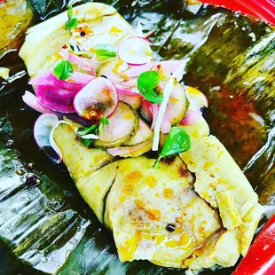 Prehispanic Tamal / chicken / Shrimp / pork ribs Pickles cucumber / onions /watercress