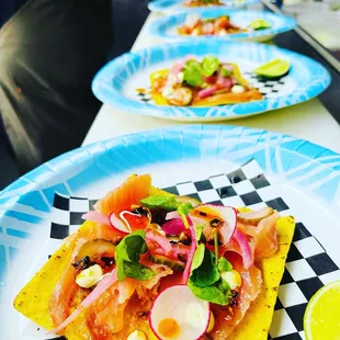 Smoked Slmon Tostada / radish / salsa macha / pickles cucumber &amp; onions watercress