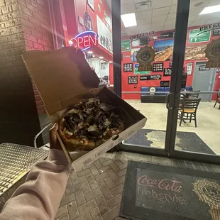 Fresh sliced mozzarella, Precinct Pizza sauce, extra virgin Italian olive oil, fresh basil, mushrooms, onions and garlic.