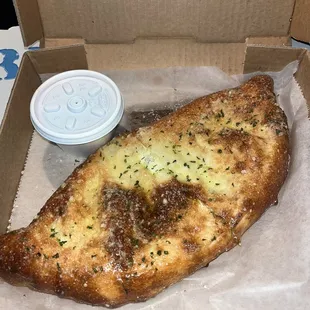 Cheese calzone the garlic and cheese are amazing