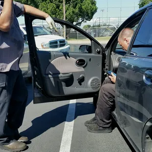 Auto Techs at Precision Automotive getting the codes from my car.