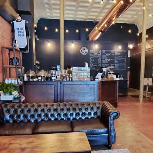 a leather couch and coffee table