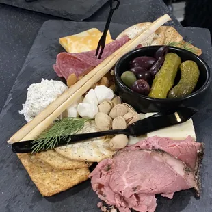 Meat and cheese charcuterie board.
