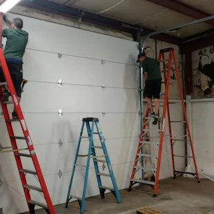 Kevin and Mario working on a 12x12 door.