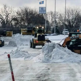 a pile of snow in a parking lot