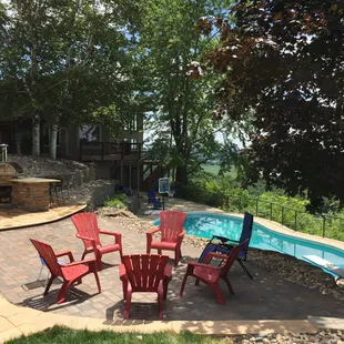 a patio with a fire pit
