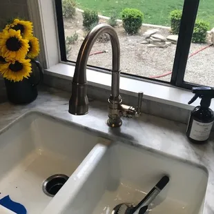 This happy customer had great taste. Such a beautiful kitchen faucet.