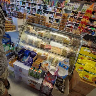 a woman shopping in a grocery store