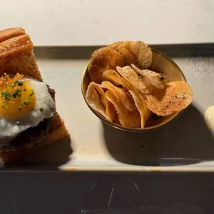 Truffle Wagyu Slider
 Wagyu Patty | Fried Quail Egg | Gruyere Cheese | Truffle Aioli | Crispy Shallot | Chives