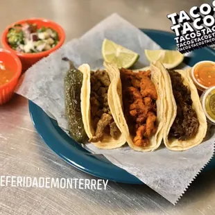 We have tacos de fajita, al pastor, lengua, chicharrón, picadillo, pollo, and lengua