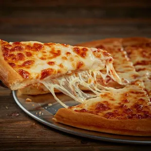 a slice being taken out of a pizza