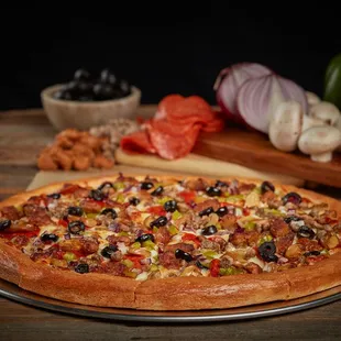 a pizza on a wooden table