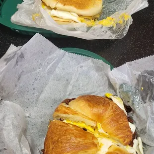 Bacon egg and cheese croissant and breakfast bagel sandwich