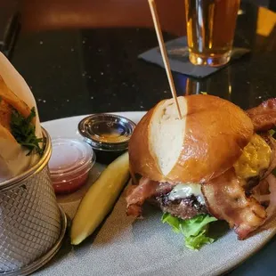 a burger and fries on a plate