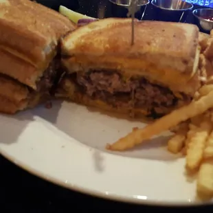 try the royal flush burger at prema lounge.  a deal for $8 during happy hr!!  Then you can tell your friends you got a royal at del sol!!