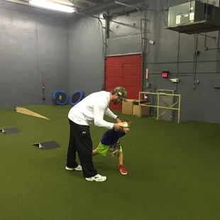 Pitching instructor Bob Zimmermann giving pitching lessons at Premier Baseball Kansas City Baseball Facility