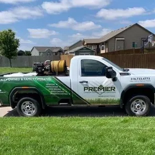 a truck parked in a driveway