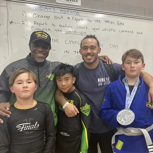 Professor Liner, Coach Nathan coaching these kids to victories in our Jiu Jitsu program at Premier Martial Arts/ Jiu Jitsu