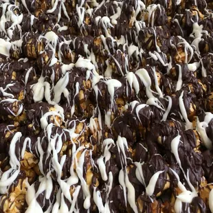 Tuxedo- caramel corn drizzled with chocolate and white chocolate