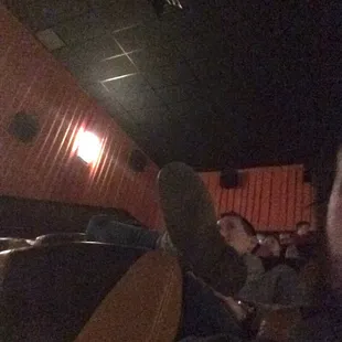 Merry Christmas everyone! Tried to enjoy a holiday movie but jerk behind kept swinging his foot inches from my head. Won't be back.