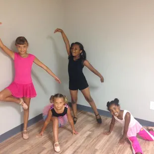 Prima Ballerinas posing in class!