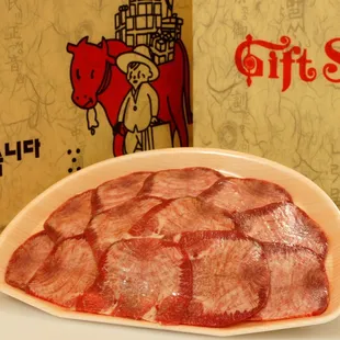 a cut of meat in a bowl