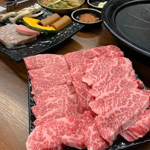 a variety of raw meats