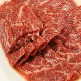 a plate of raw beef