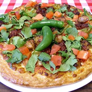 El Tri Pizza (Onions, fresh jalapenos, fresh tomato, sausage, chorizo, red, white, &amp; pesto sauce finished with cilantro)