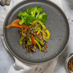 a plate of stir fried vegetables