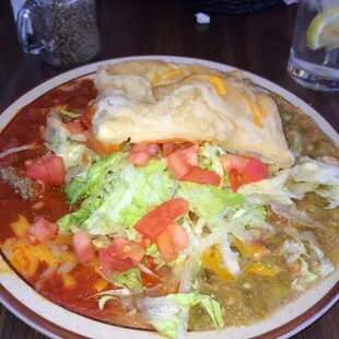 Stuffed sopapilla smothered in red and green chile!