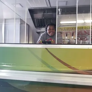 a man behind a food truck