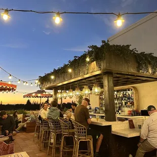 people sitting at a bar