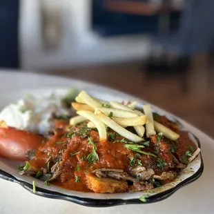 İskender Kebab: Lamb &amp; Beef Gyro w/ butter toasted pita, homemade marinara sauce, greek yogurt | $23.95