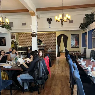 a group of people sitting at a table