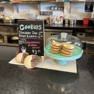 a display of cookies and pastries on a counter